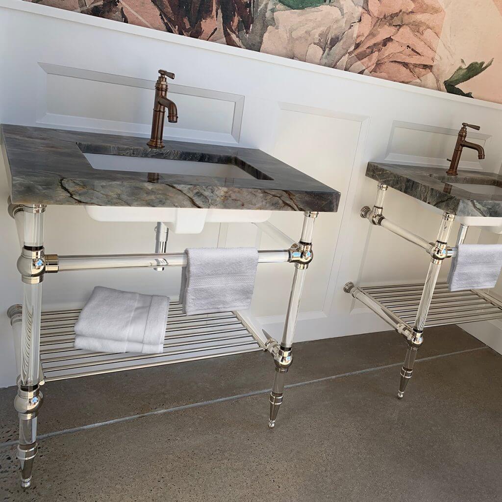 A pair of Tapered Foot style vanities in polished nickel with Perma